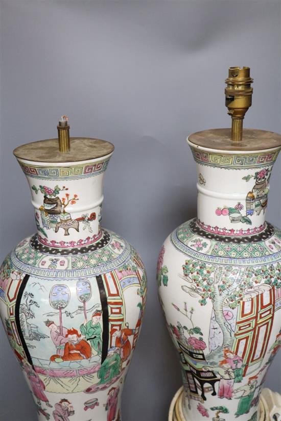 A pair of Chinese-style famille rose table lamps and shades, total height to fitting 57.5cm, one lamp fitting lacking